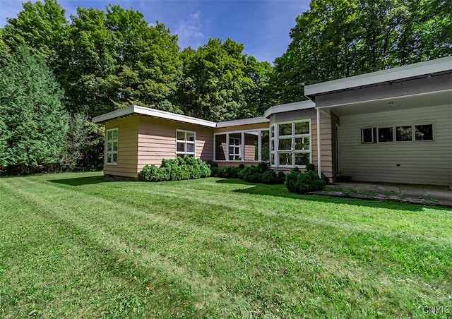 view of yard featuring a carport