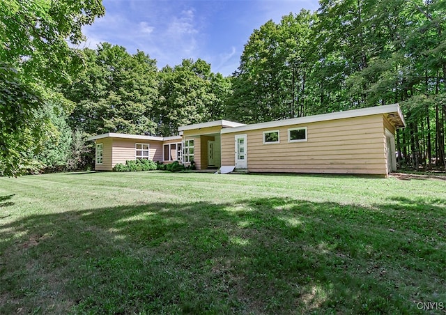 view of front of home with a front lawn