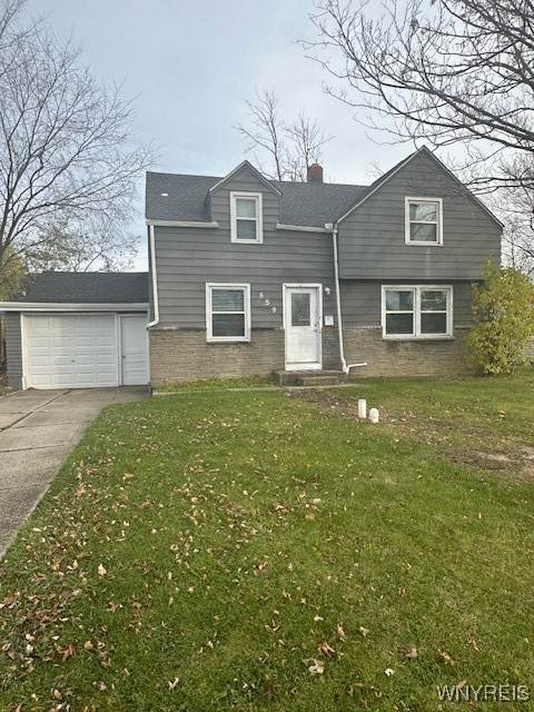 view of front facade with a garage and a front yard