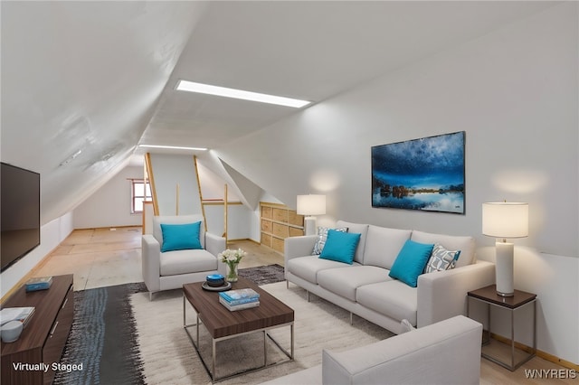 living room with light wood-type flooring and lofted ceiling