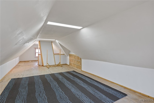 bonus room with vaulted ceiling