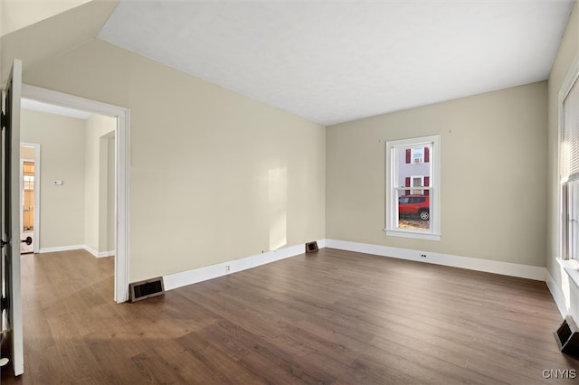 unfurnished room featuring wood-type flooring