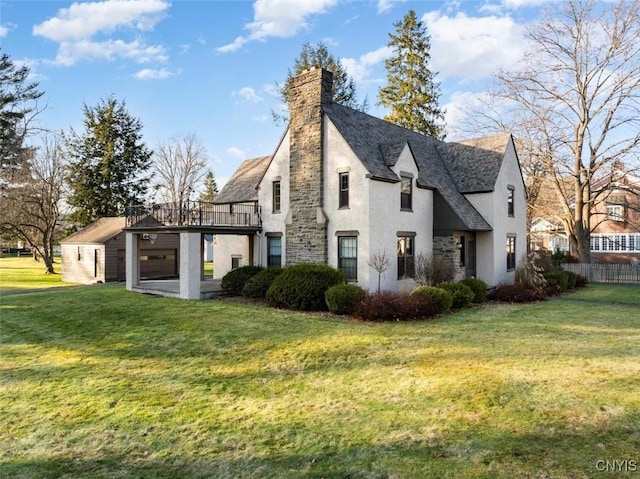 30 University Ave, Hamilton, NY 13346 - view of home's exterior featuring stucco siding, a chimney, and a wooden deck