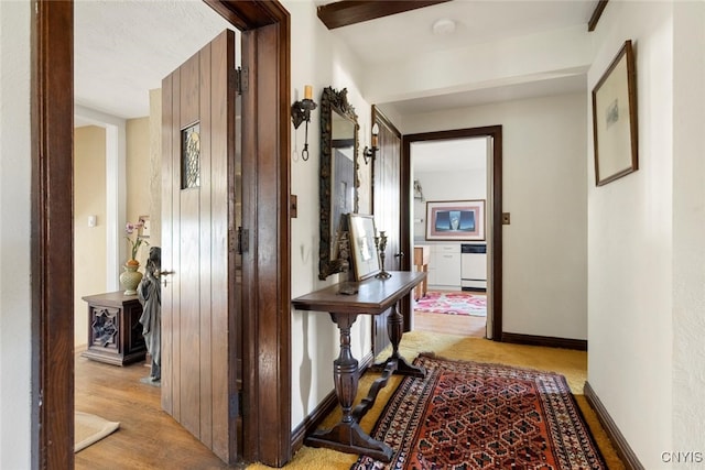 hallway with light wood-type flooring