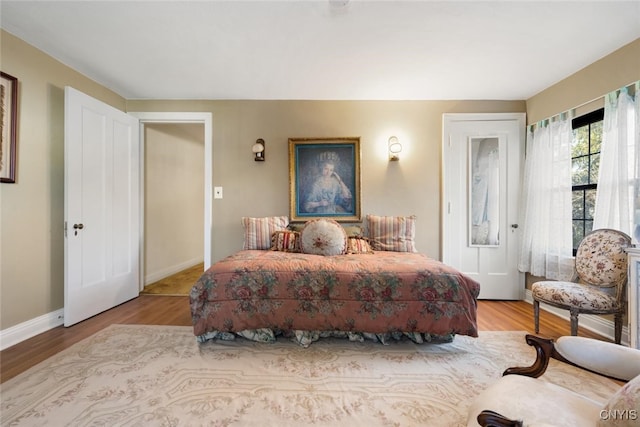 bedroom featuring light wood-type flooring