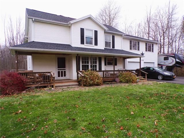 view of front of house with covered porch and a front yard