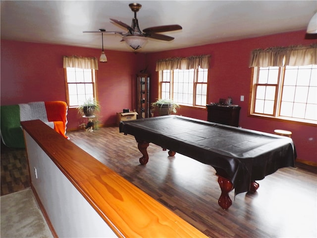 game room with hardwood / wood-style floors, plenty of natural light, ceiling fan, and billiards