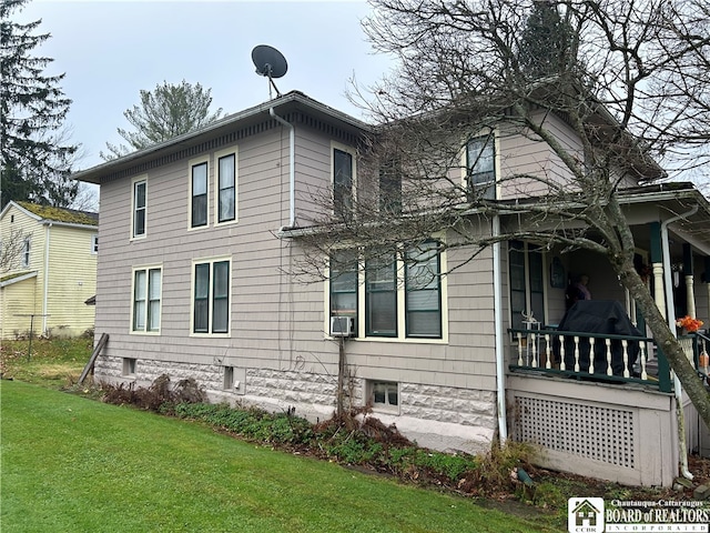 exterior space with a yard and a porch