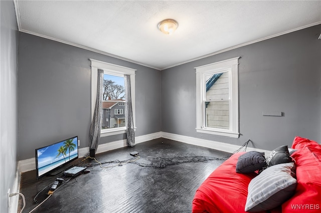 interior space featuring crown molding and a textured ceiling