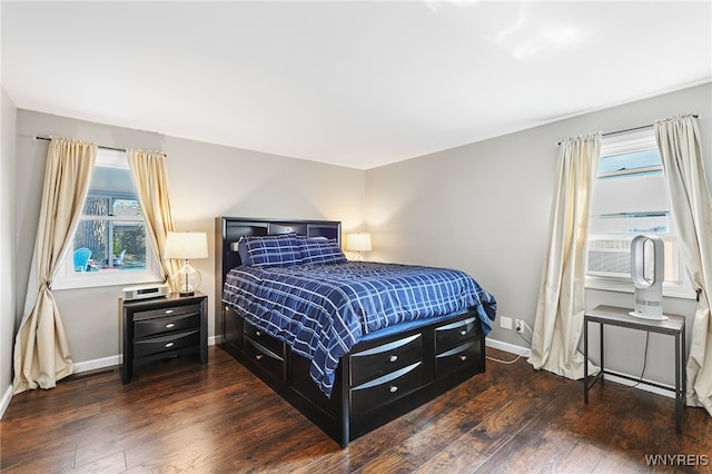 bedroom featuring dark wood-type flooring