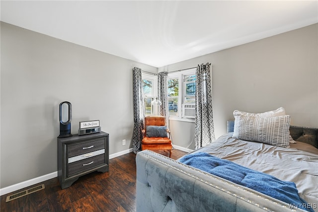 bedroom featuring dark hardwood / wood-style floors