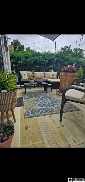 deck with an outdoor living space