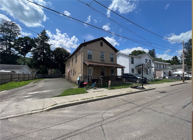 front of property featuring covered porch