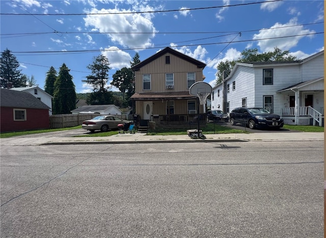 front of property featuring covered porch