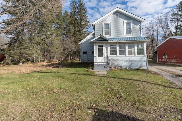 view of front of home with a front lawn