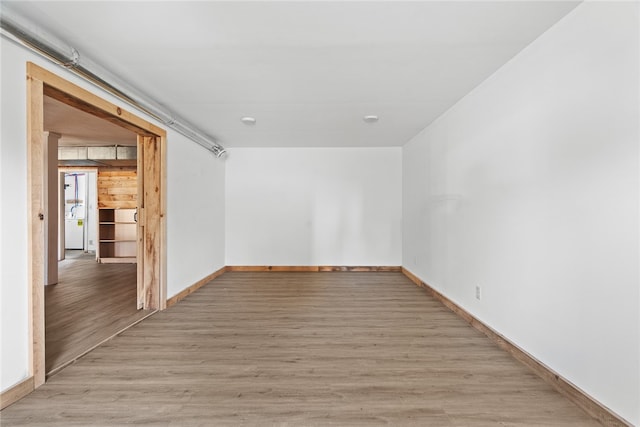 spare room featuring light hardwood / wood-style floors