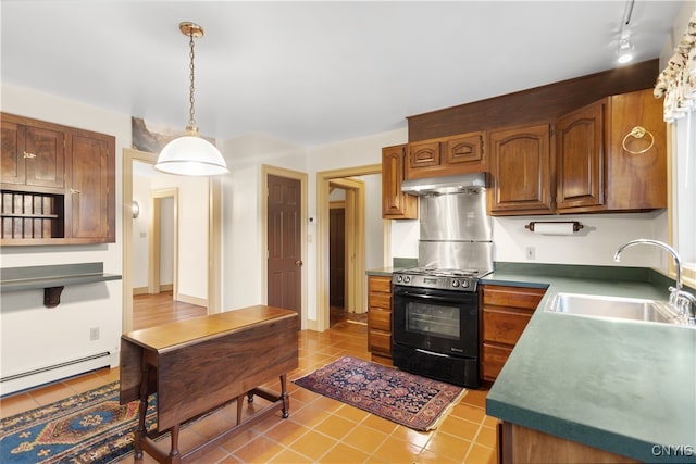 kitchen featuring black range oven, hanging light fixtures, sink, light tile patterned floors, and extractor fan