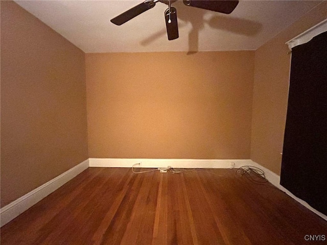 unfurnished room featuring ceiling fan and wood-type flooring