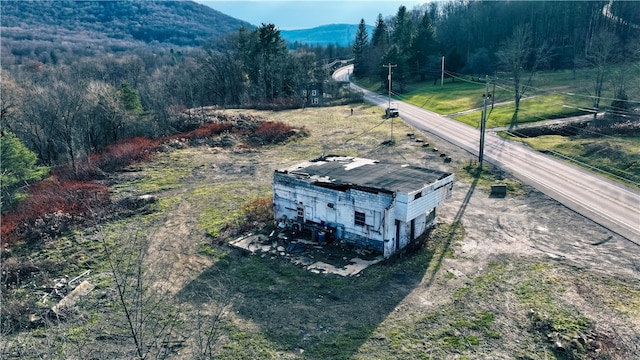 drone / aerial view featuring a mountain view