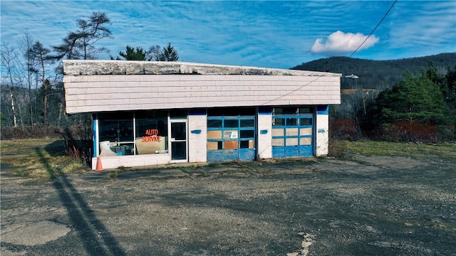 view of outdoor structure with a mountain view