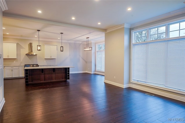 living room with crown molding and dark wood-type flooring