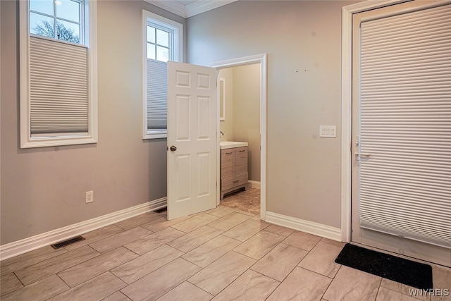 foyer entrance with ornamental molding