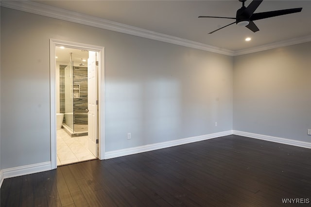 empty room with dark hardwood / wood-style floors, ceiling fan, and crown molding