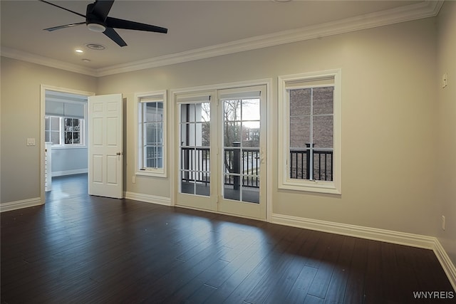 doorway to outside featuring dark hardwood / wood-style floors, ceiling fan, and crown molding