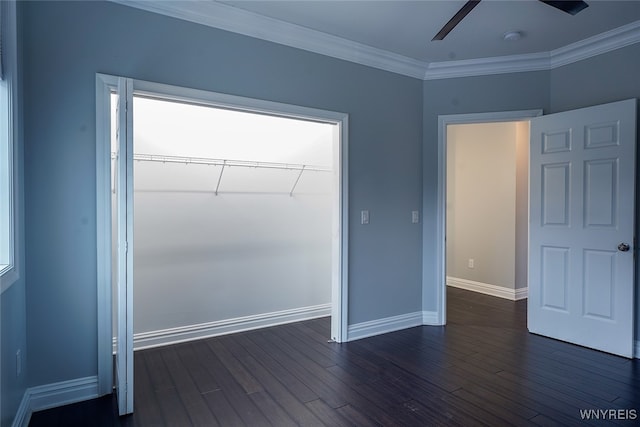 unfurnished bedroom featuring dark hardwood / wood-style flooring, a closet, ornamental molding, and ceiling fan