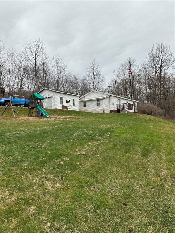 view of yard with a playground