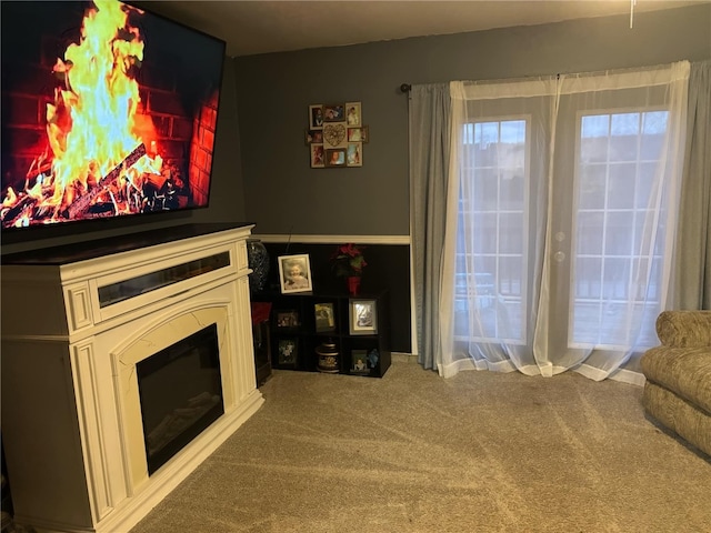 unfurnished living room featuring carpet flooring