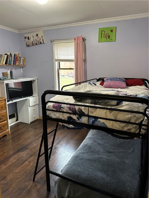 bedroom with ornamental molding and dark wood-type flooring