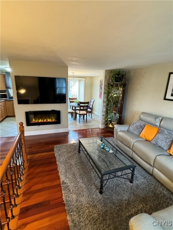 living room featuring dark hardwood / wood-style flooring