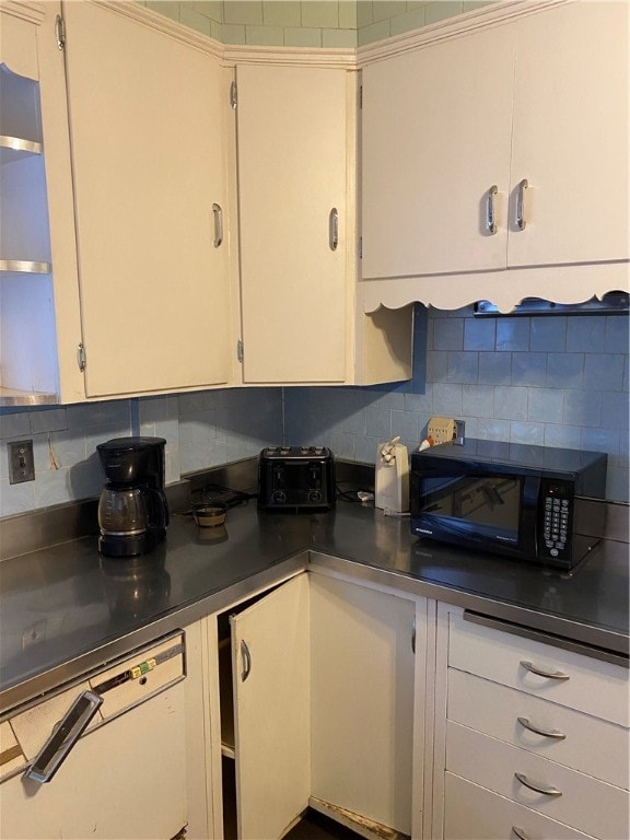 kitchen with backsplash, white cabinetry, and white dishwasher