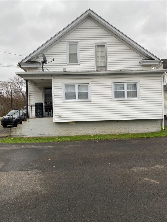 view of home's exterior featuring a porch