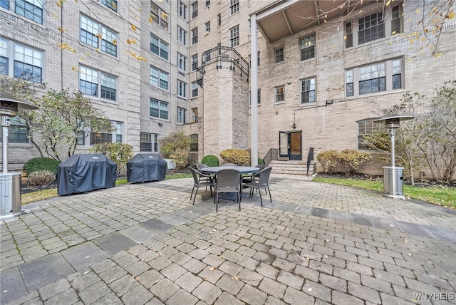 view of patio with a grill