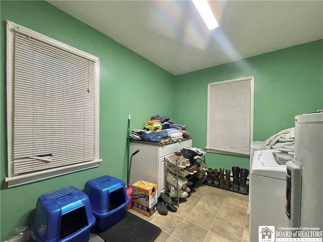 clothes washing area featuring washing machine and clothes dryer