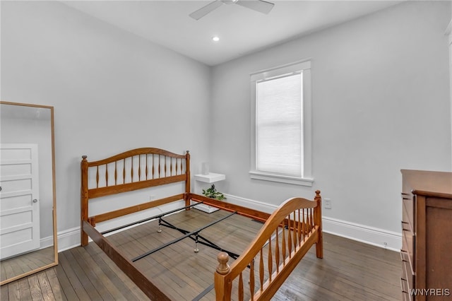 bedroom featuring ceiling fan and dark wood-type flooring