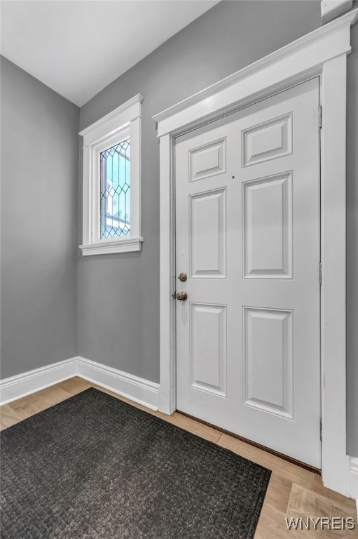 foyer entrance with light hardwood / wood-style flooring