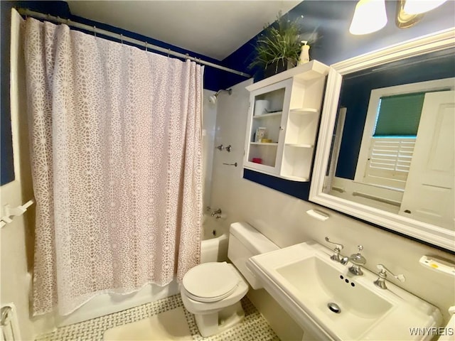 9 Mayfair Ln, Buffalo, NY 14201 - full bathroom featuring a sink, shower / tub combo with curtain, toilet, and tile patterned flooring