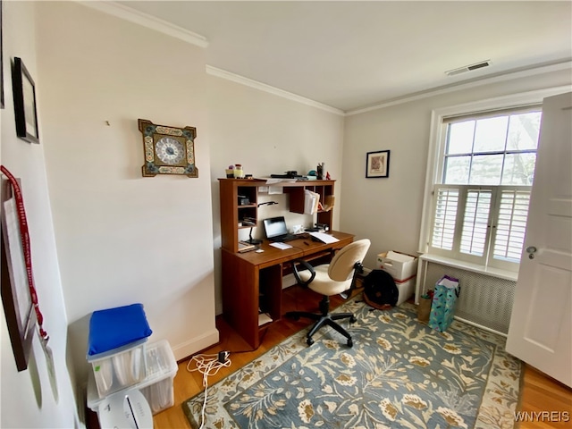 office featuring wood-type flooring and ornamental molding