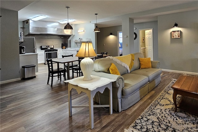 living room with dark hardwood / wood-style flooring