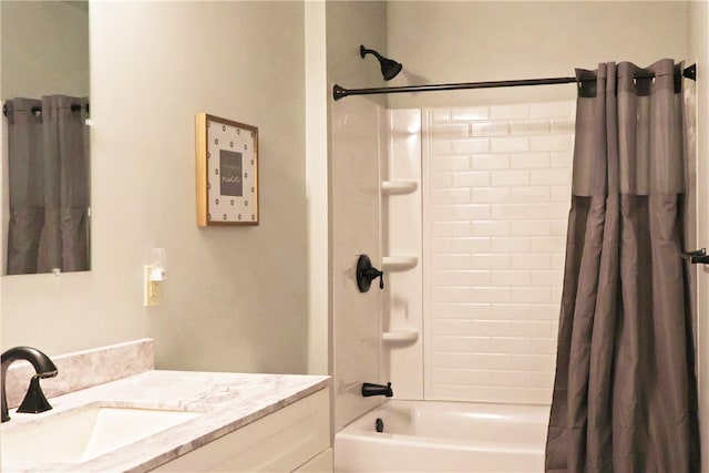 bathroom featuring vanity and shower / tub combo with curtain