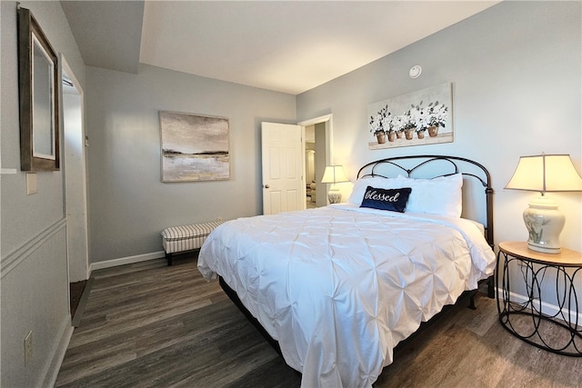 bedroom featuring dark hardwood / wood-style floors