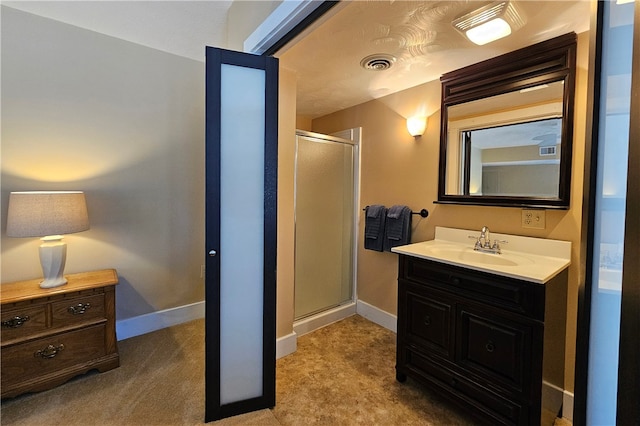 bathroom featuring vanity and walk in shower