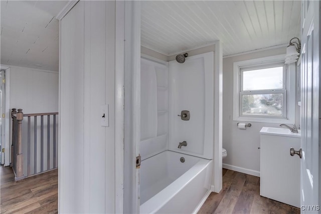 full bathroom featuring shower / tub combination, vanity, wood-type flooring, and toilet