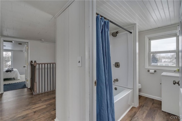 full bathroom featuring hardwood / wood-style flooring, shower / bath combination with curtain, vanity, and a wealth of natural light