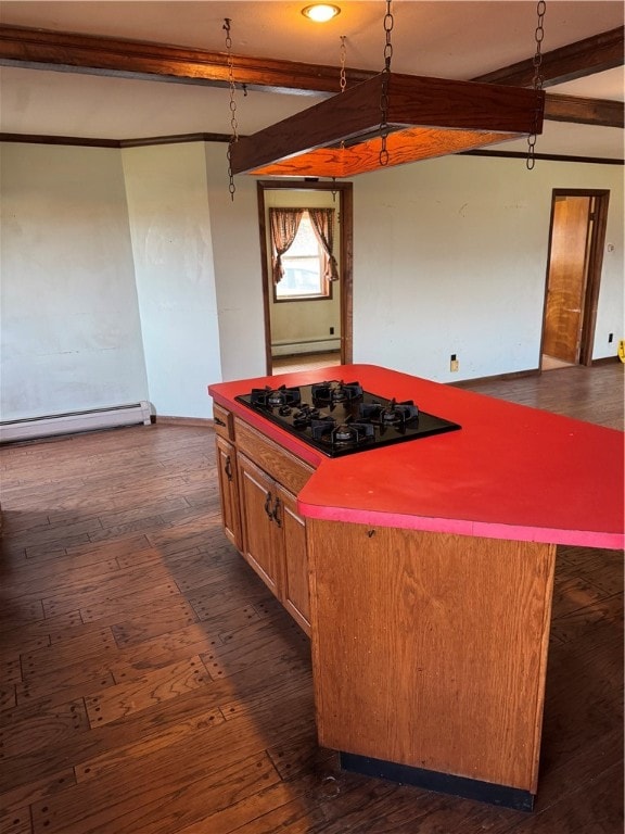 kitchen featuring dark wood-type flooring, black gas cooktop, a baseboard heating unit, beamed ceiling, and a kitchen island