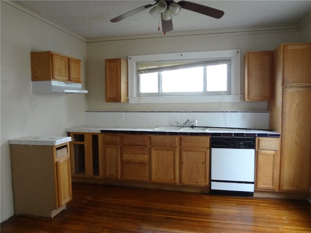 kitchen with dark hardwood / wood-style flooring, ceiling fan, sink, tile countertops, and dishwasher