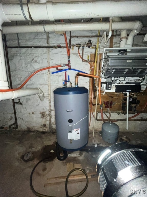 utility room with water heater